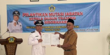 Kepala Desa Sidoraharjo Suwoto, SH.. bersama Kasun Traseng Nursim usai proses pelantikan